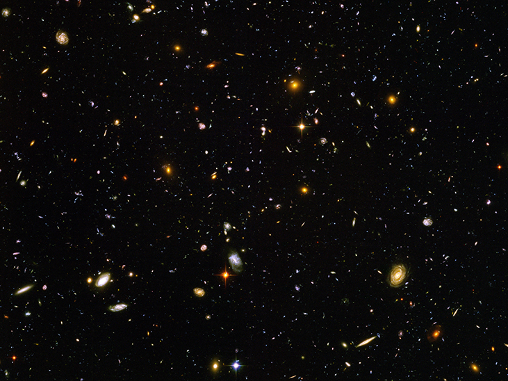 An image shows the stars and objects visible in the Ultra-Deep Field.